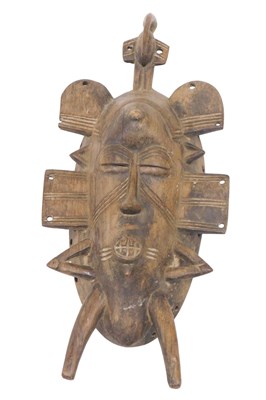 Lot 219 - A Senufo Kpelie tribal mask, Ivory Coast, 34cm...