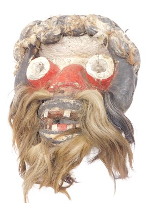 Lot 222 - A Dan tribal mask, Ivory Coast, 42cm high.