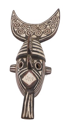 Lot 224 - A Bwa tribal mask, Ivory Coast, 69cm high.