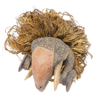 Lot 226 - A Baule ram tribal mask, Ivory Coast, 28cm high.