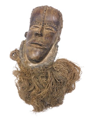Lot 250 - A Bete tribal mask, Ivory Coast, 40cm high.