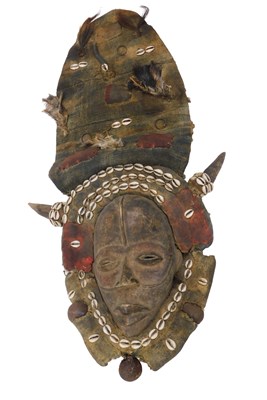 Lot 255 - A Dan tribal mask, Ivory Coast, 34cm high.