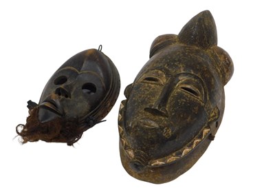 Lot 261 - A Baule tribal mask, Ivory Coast, 39cm...