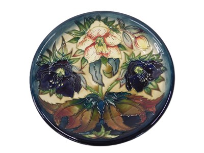 Lot 18 - A Moorcroft floral charger, with tube line...