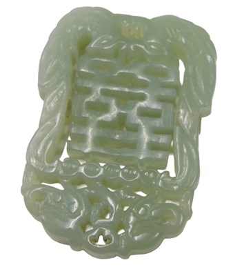 Lot 53 - A carved jade pendant, the central loose...
