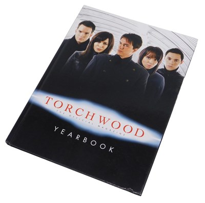 Lot 142 - A Doctor Who Torchwood yearbook, signed by two...