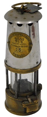 Lot 150 - An Eccles Protector Miner's lamp, in polished...