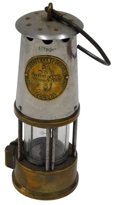 Lot 151 - An Eccles Protector Miner's lamp, in polished...