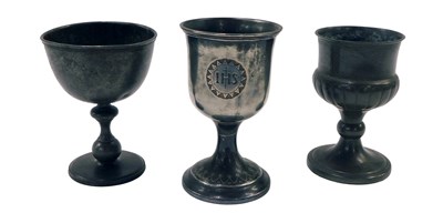 Lot 183 - A 19thC pewter chalice or goblet, another...