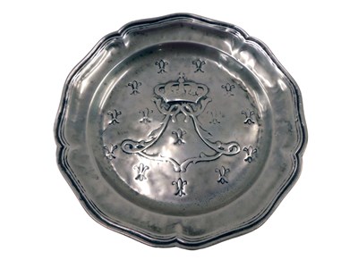 Lot 198 - A Continental pewter plate, decorated with a...