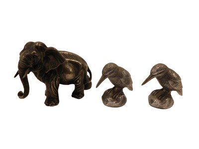 Lot 265 - A pewter elephant, 16cm long, and a pair of...