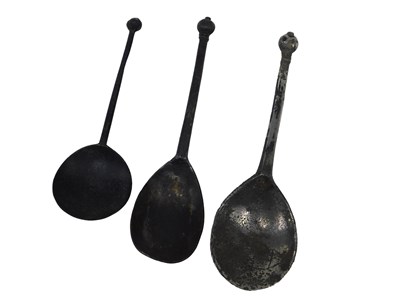 Lot 283 - Three 17thC pewter spoons, each with an orb...