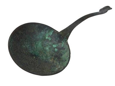 Lot 287 - A bronze spoon, the shaped handle with bird's...