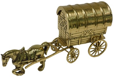 Lot 314 - A heavy brass model of a gypsy caravan, the...