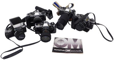Lot 318 - Five Olympus OM10 cameras, together with a...