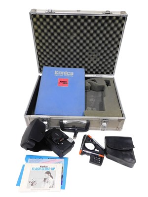 Lot 325 - A Konica C35AF camera, with service manual,...