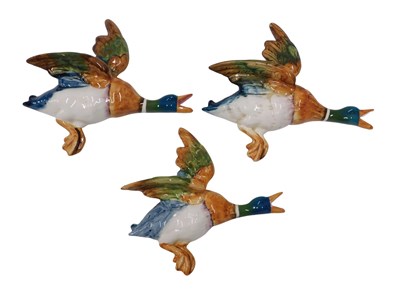 Lot 346 - Three Beswick pottery flying mallard wall...