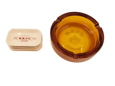 Lot 348 - A Krug Champagne amber glass advertising ash...