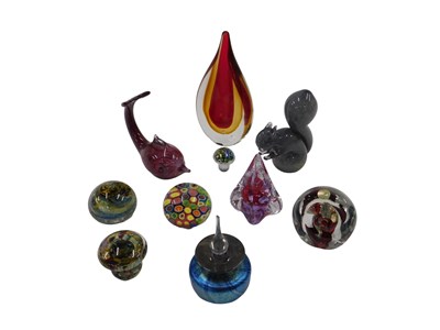Lot 362 - A group of glass sculptures, paperweights, and...