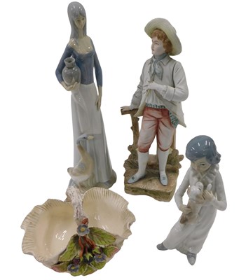 Lot 372 - Two Spanish porcelain figures, modelled as a...