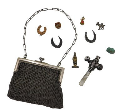 Lot 398 - A George V silver baby's rattle, with mother...