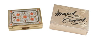 Lot 478 - A Japanese musical powder compact, with...