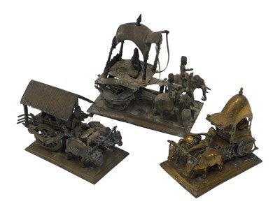 Lot 518 - An Indian brass model of a carriage pulled by...