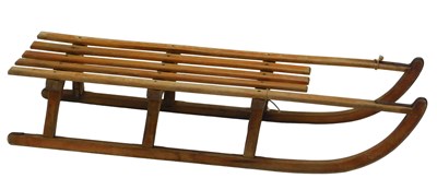 Lot 566 - A slatted wooden and metal mounted...