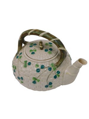 Lot 601 - A 19thC Belleek porcelain teapot, with...