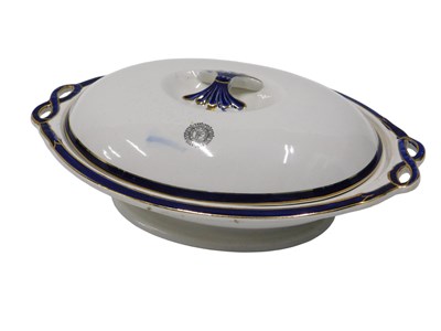 Lot 606 - A Belleek pottery oval tureen and cover, the...