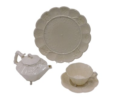 Lot 613 - A 19thC Belleek porcelain small teapot, of...