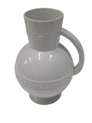 Lot 622 - A 19thC Belleek pottery wash jug, with a white...