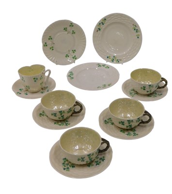 Lot 628 - Various Belleek Shamrock pattern cups, saucers...
