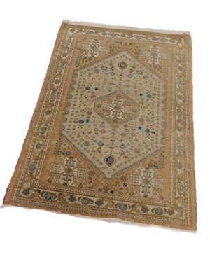 Lot 671 - A Turkish rug, with a design of flowers and...