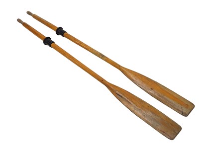Lot 700 - A pair of pine boat oars, each with plastic...