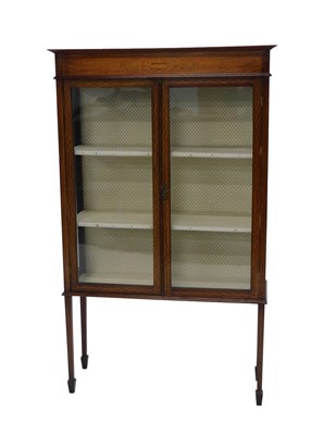 Lot 638 - An Edwardian mahogany and inlaid cabinet, the...