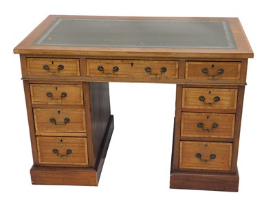 Lot 666 - A mahogany and crossbanded pedestal desk, the...