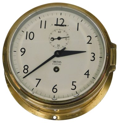 Lot 143 - A Smiths Empire brass bulkhead ships...