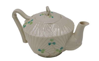 Lot 585 - A Belleek porcelain teapot, decorated with the...