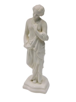Lot 592 - A Belleek porcelain figure of a scantily clad...