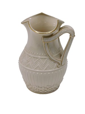 Lot 593 - A 19thC Belleek jug, with geometric wavy band...