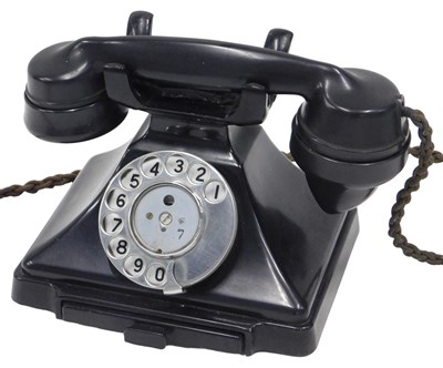 Lot 118 - A black Bakelite vintage telephone, numbered...