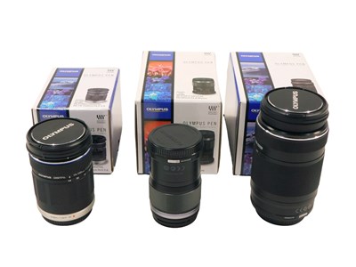 Lot 556 - An Olympus digital ED 60mm macro lens, an ED...