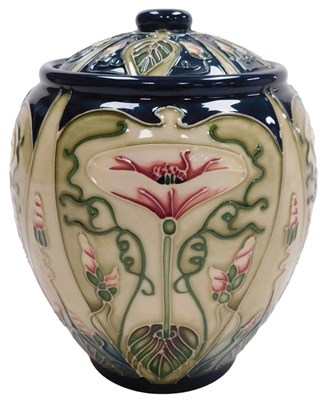 Lot 115 - A Moorcroft pottery Arvensis pattern jar and...