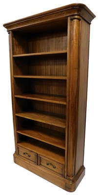Lot 8 - A walnut finish open bookcase, with a moulded...