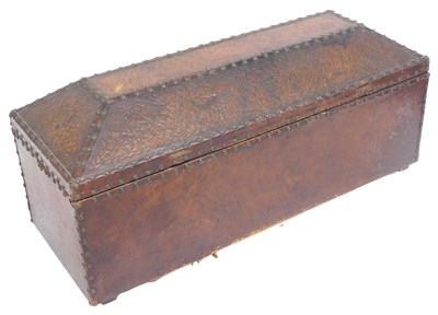 Lot 23 - An Arts & Crafts studded and tooled leather...