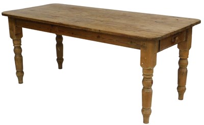 Lot 29 - A Victorian stripped pine kitchen table, with...