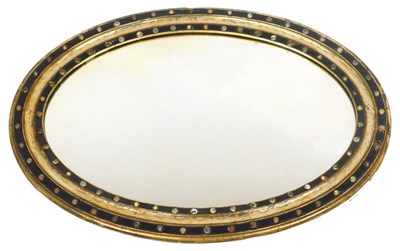 Lot 42 - A 19thC Irish mahogany oval wall mirror, with...