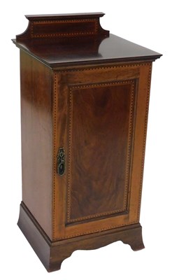 Lot 64 - An Edwardian figured and plum pudding mahogany...