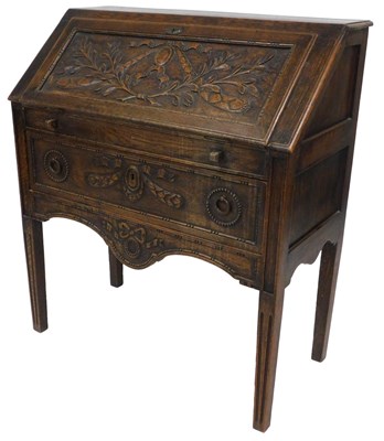 Lot 68 - A 19thC French carved oak bureau, with a full...